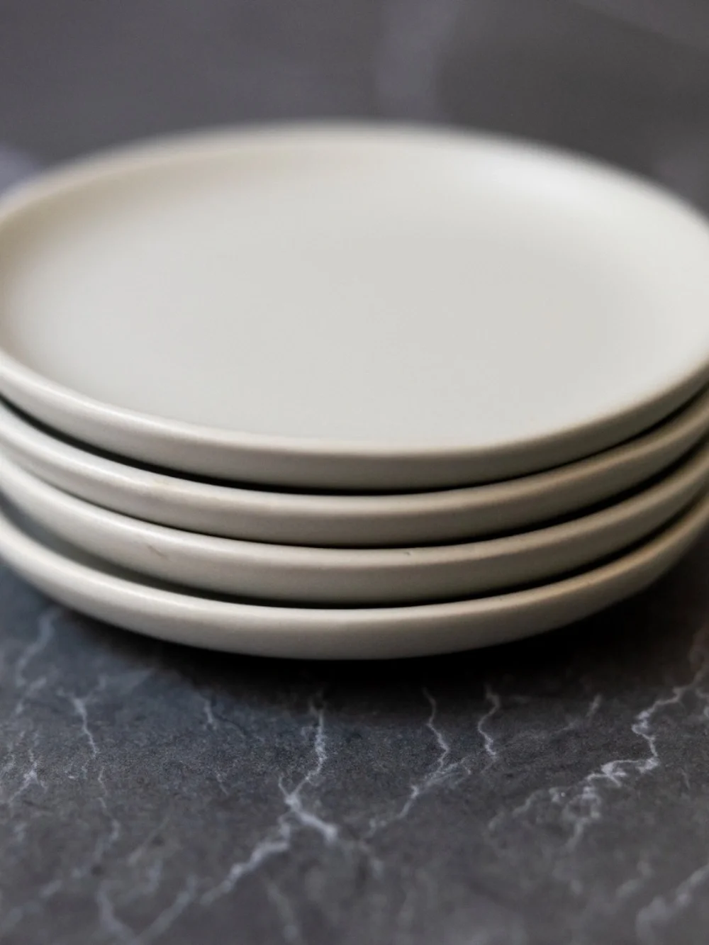 Set of 4 gray small ceramic plates Crate and Barrel made in Thailand 4.5 inches
